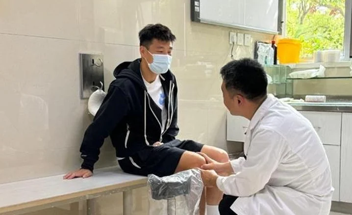 在他